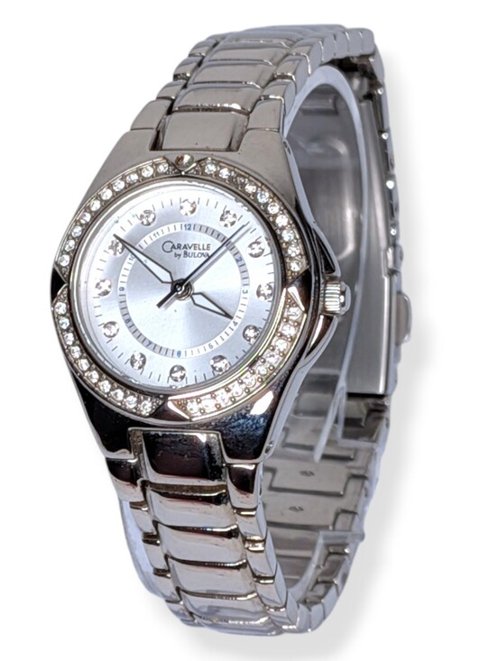 Bulova Accessories - Caravelle Bulova Womens Watch Silver Tone Rhinestone Bezel Mother of Pearl Dial